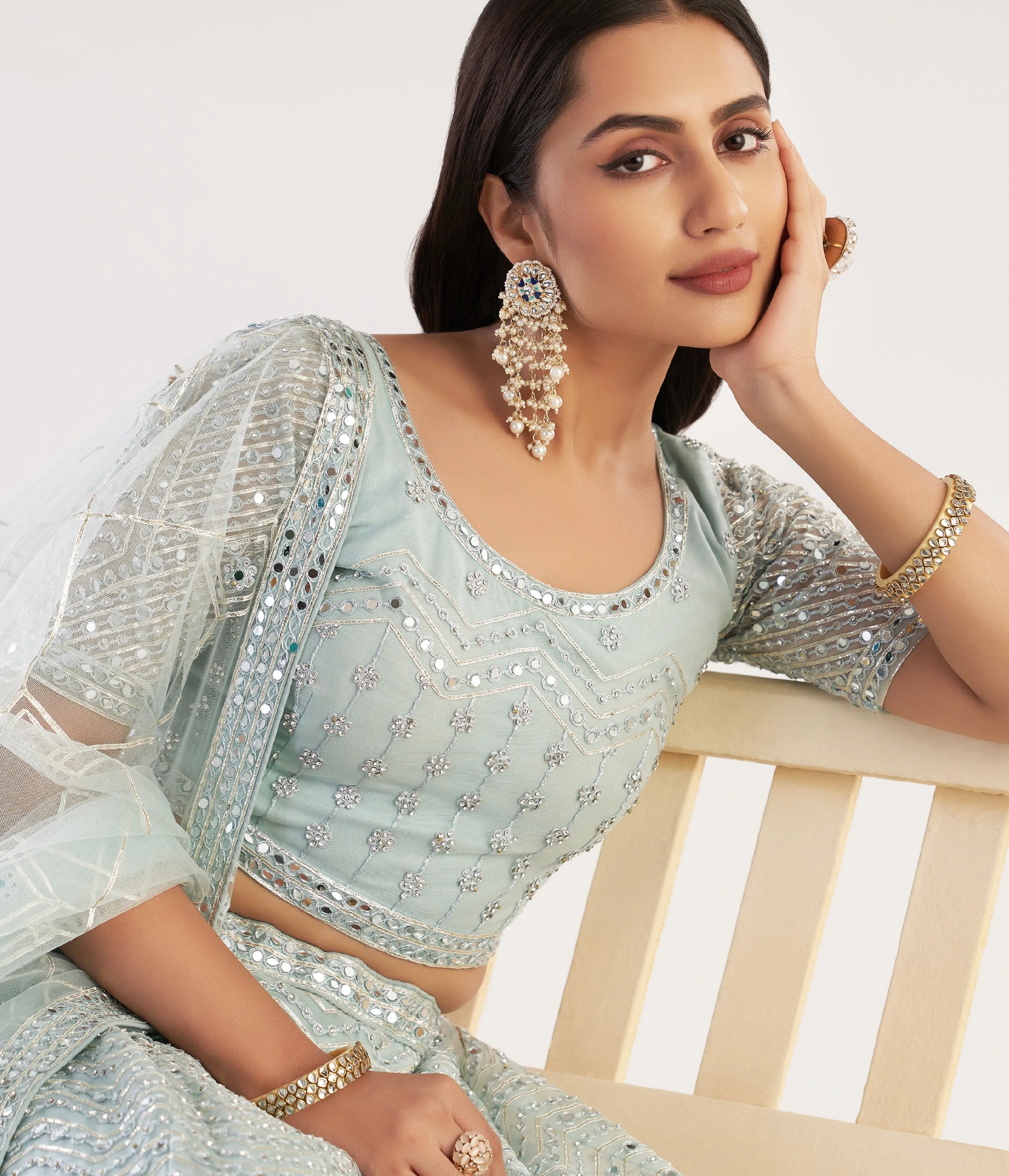 Elegant Pastel Ocean Blue Net Bridal Lehenga with Ribbon Gota Work and Heavy Zarkan Embellishments