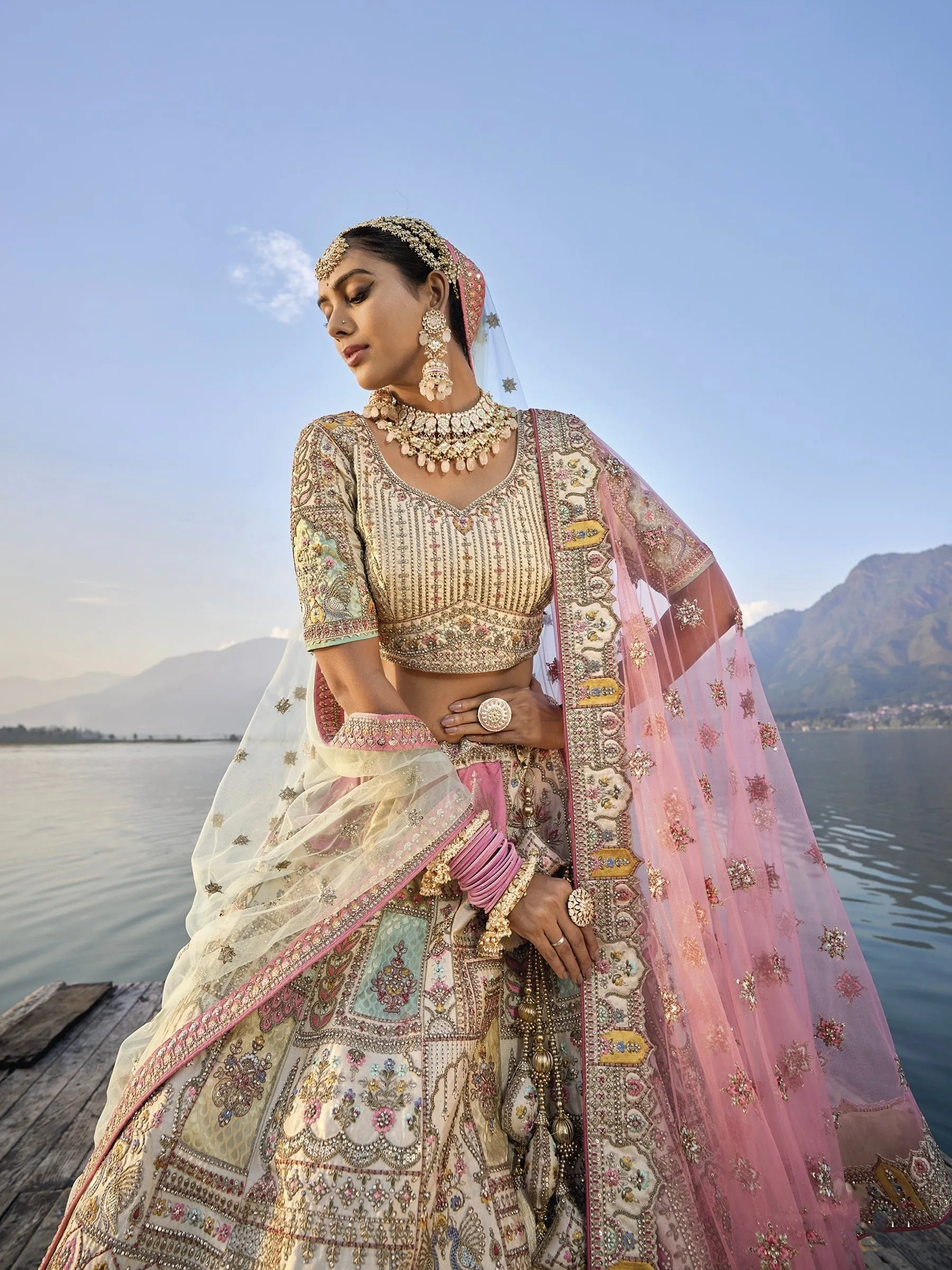 Exquisite Off-White Silk Circular Lehenga Set with Embroidered Heavy Net Dupatta