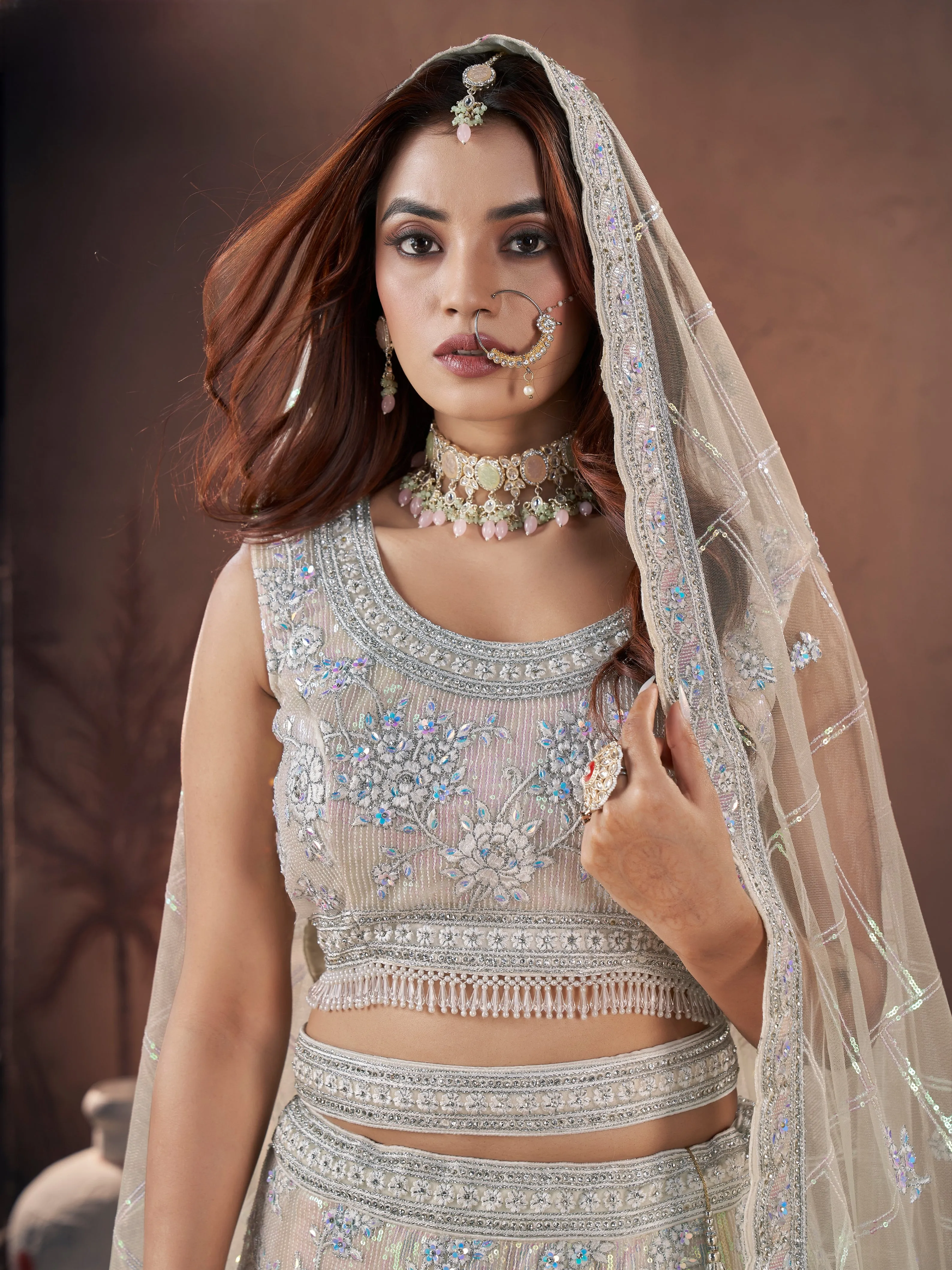 Ivory Bridal Lehenga Choli with Handworked Premium Net & Zarkan