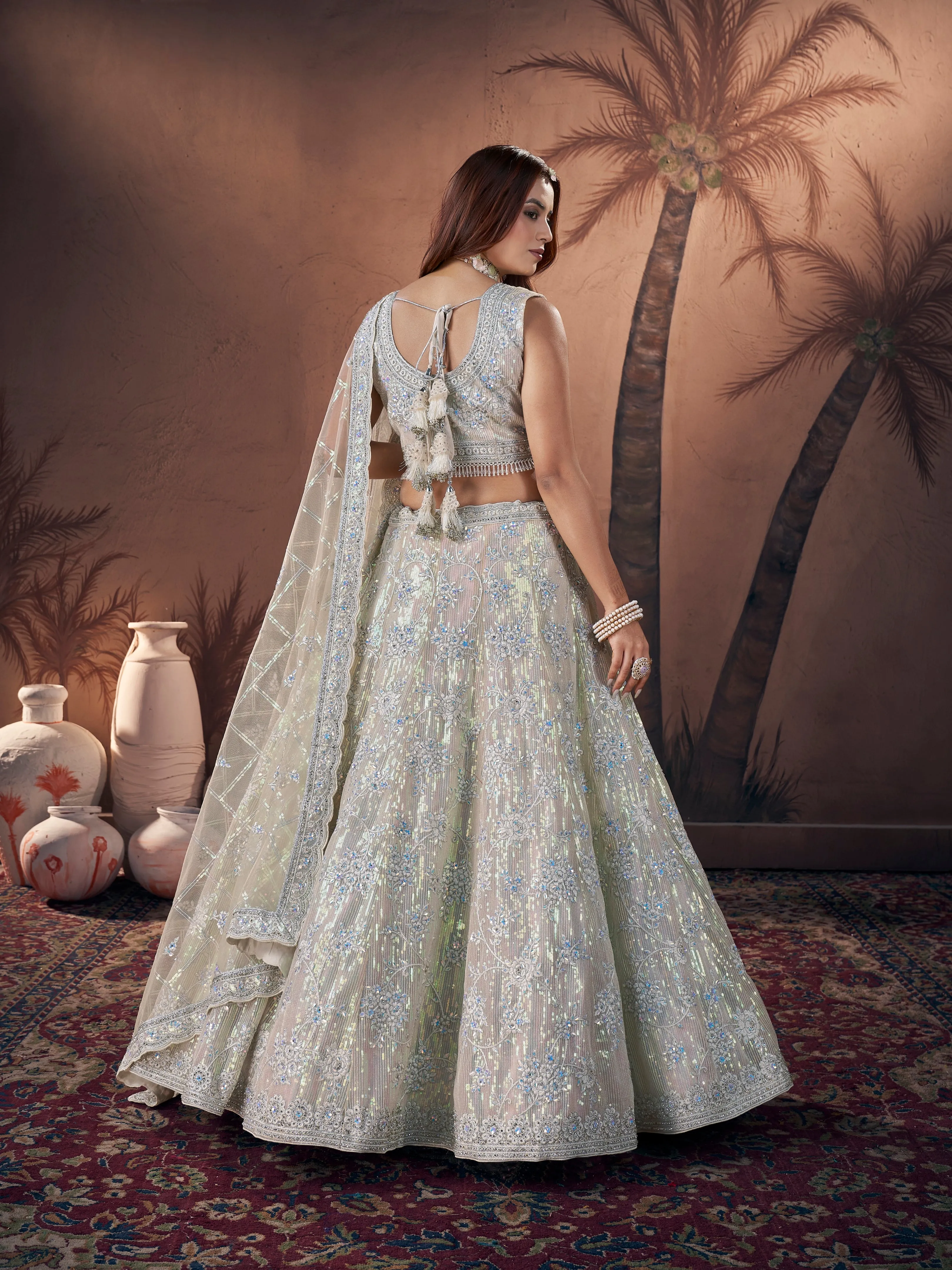 Ivory Bridal Lehenga Choli with Handworked Premium Net & Zarkan