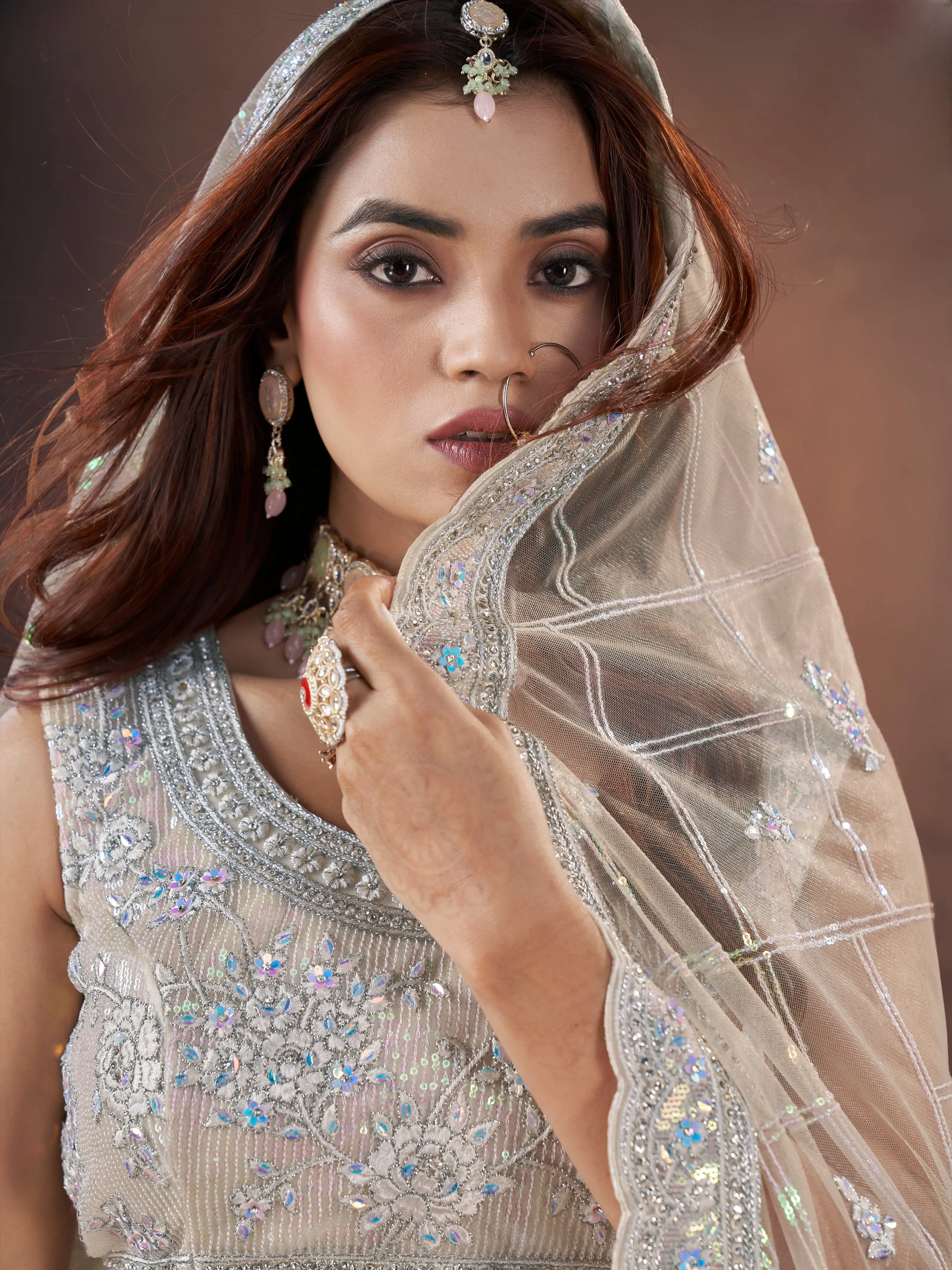 Ivory Bridal Lehenga Choli with Handworked Premium Net & Zarkan